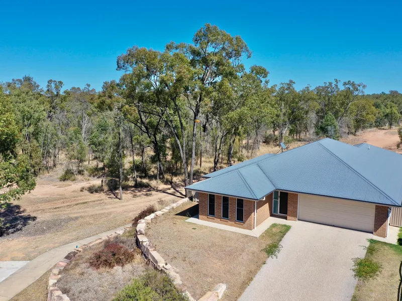 Town conveniences with unique bushland surrounding.