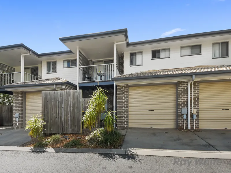 Townhouse Living in Sought After Complex!