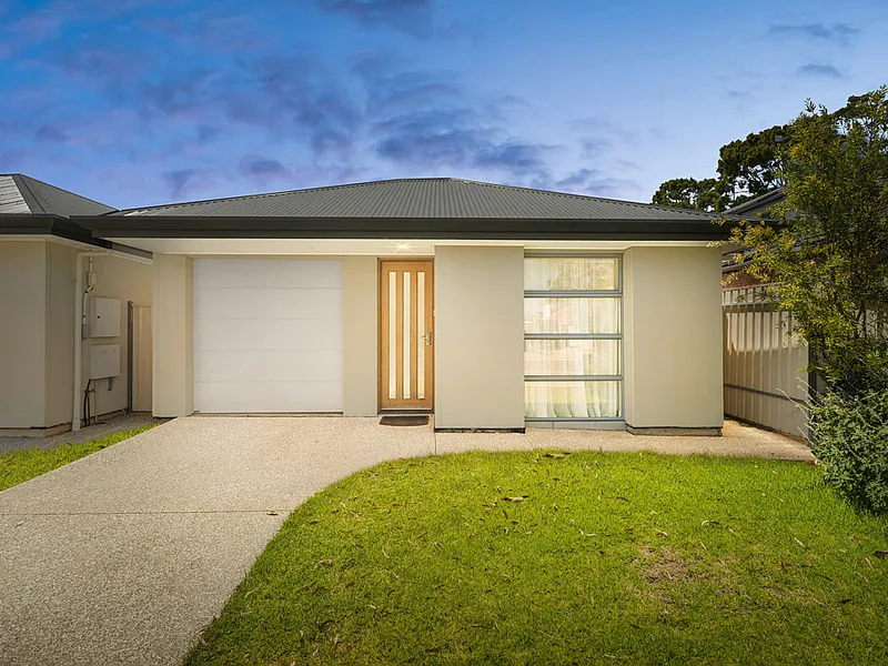 Stunning Courtyard home situated in the Brighton High School Zone