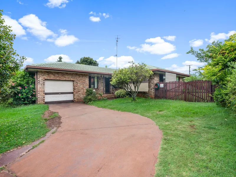Solid Brick Home in Popular Centenary Heights!