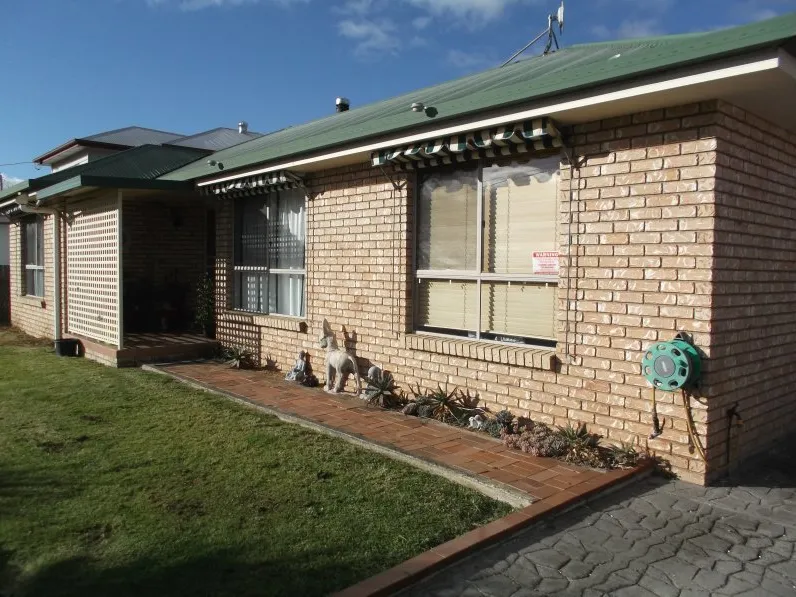 Very Comfortable Brick Home - Large Area Under Cover