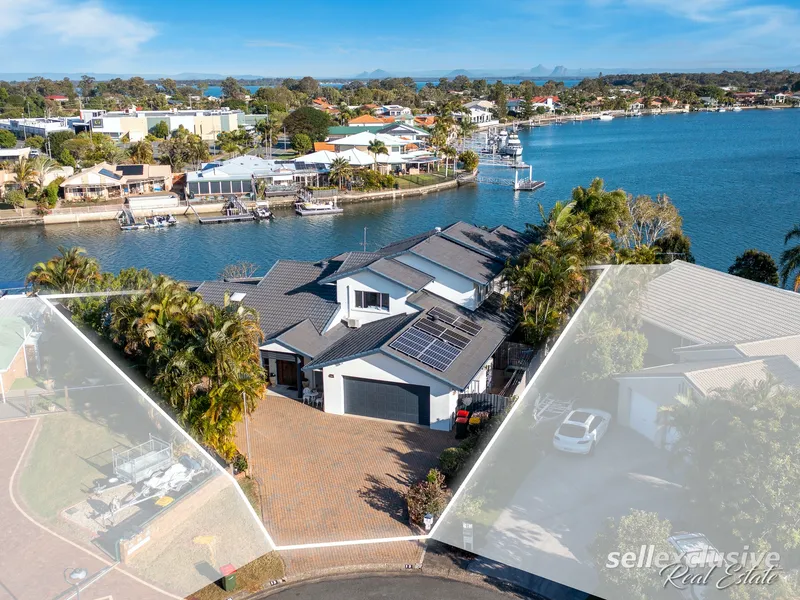 Exquisite Two-Story Canal Home with Breathtaking Water Views!