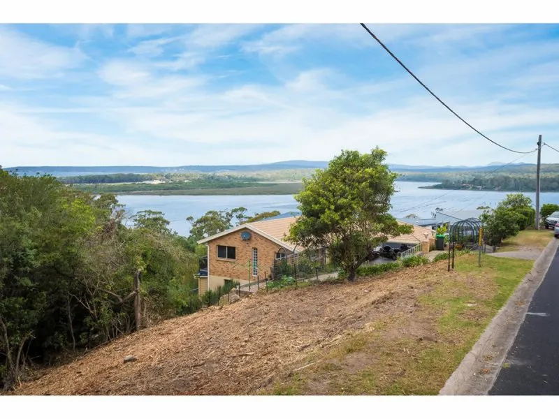 Priced To Sell With Lake and Ocean Views
