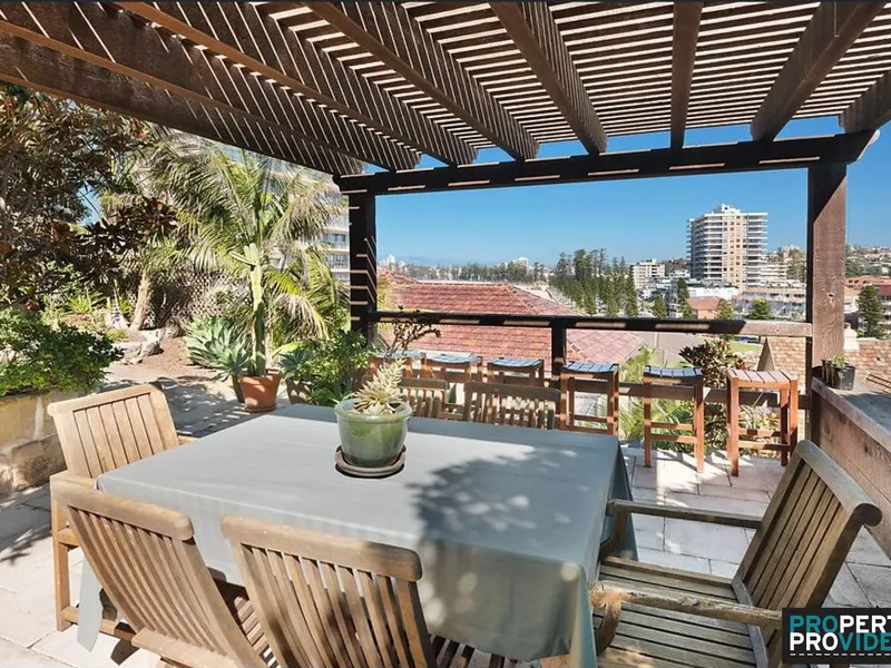 Beautiful five bedroom family home within metres from iconic Manly beach