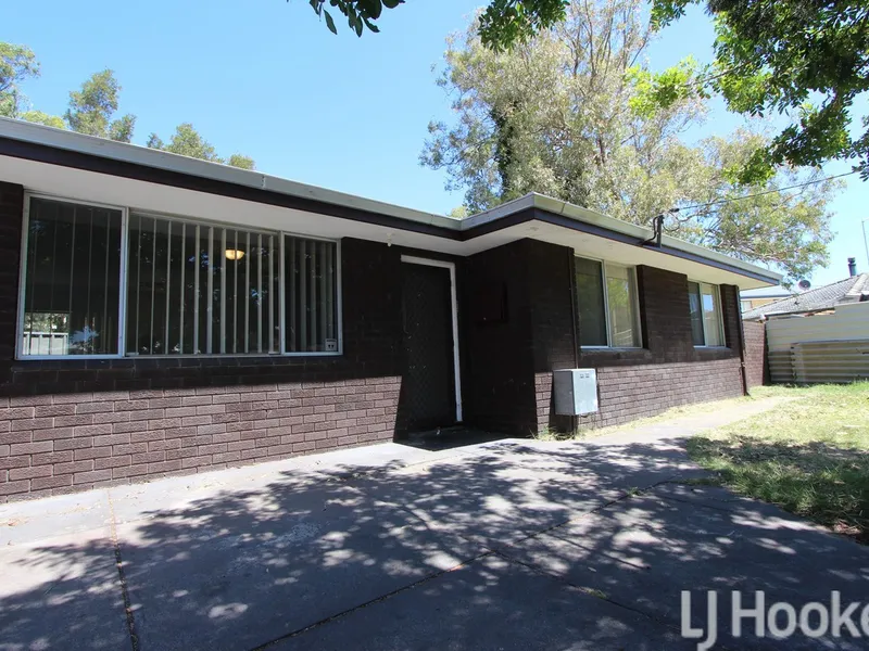 Tidy, Tucked Away, & Close to Town!