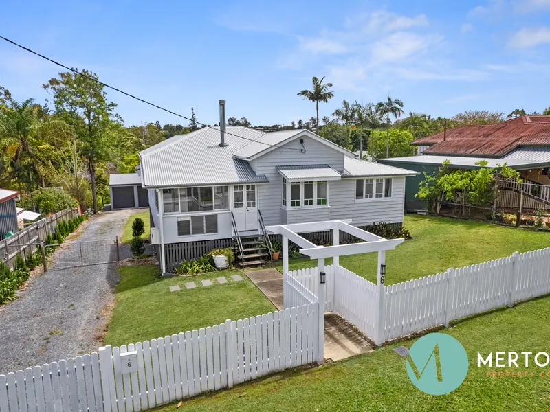 Updated and Charming Queenslander on a Stunning Lot