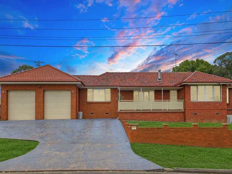 Impeccably appointed family brick home on a corner block in a sought-after enclave