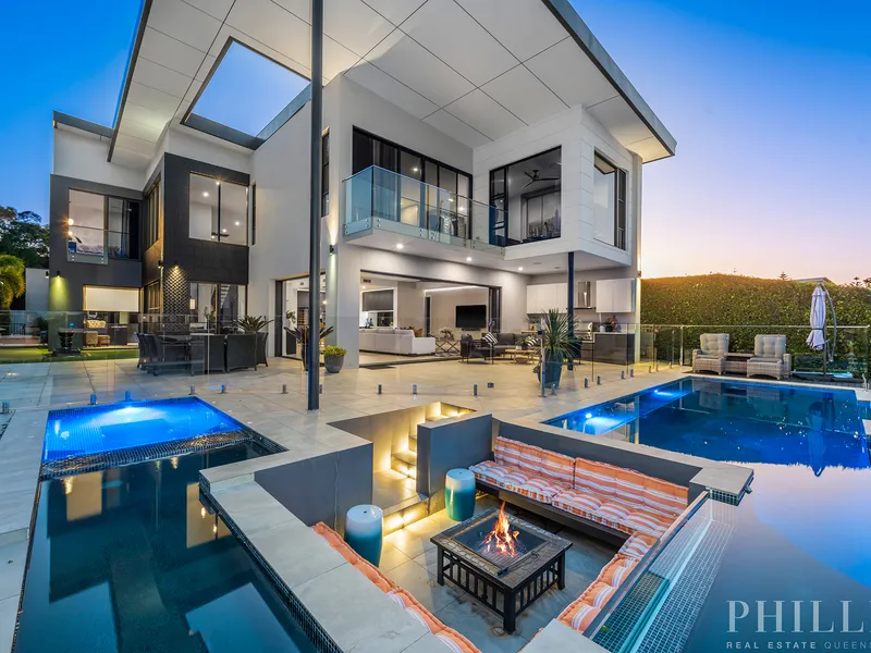 Modern & Sleek Luxe, North facing wide waterfront to a sheltered bay. A Bold Statement in Sanctuary Cove Luxury Lifestyle.