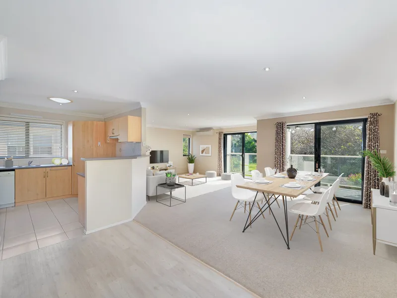 Light-filled split-level family home poised to capture stunning views