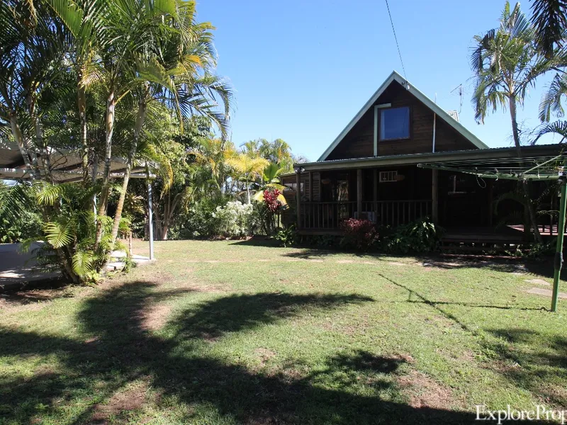 Aura of relaxation on this unique 5 acre property