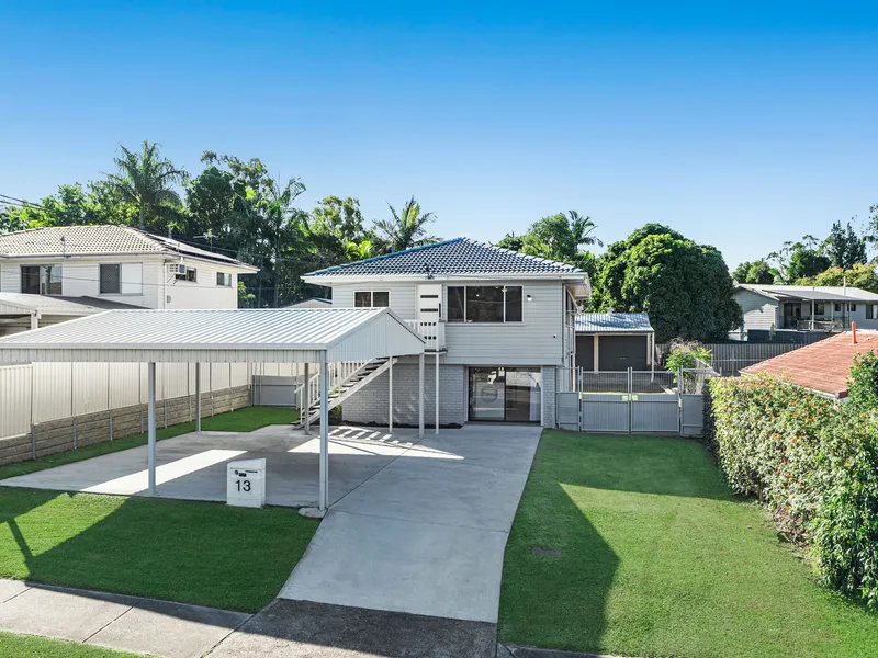 Low maintenance living on 690sqm with side access + double bay shed