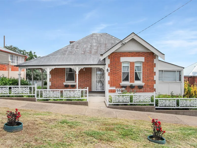 Charming Double Brick Home with Stunning Views in East