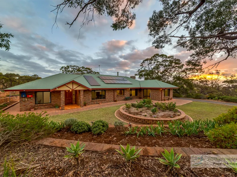 A hidden gem - on approx 2.014 HA.  Enjoy the spacious surroundings inside and out!