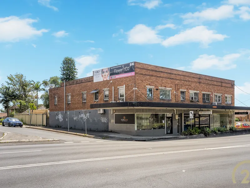ENTIRE CORNER PARCEL - TO BE SOLD SEPARATELY - 3 RETAIL SHOPS + 7 FLATS