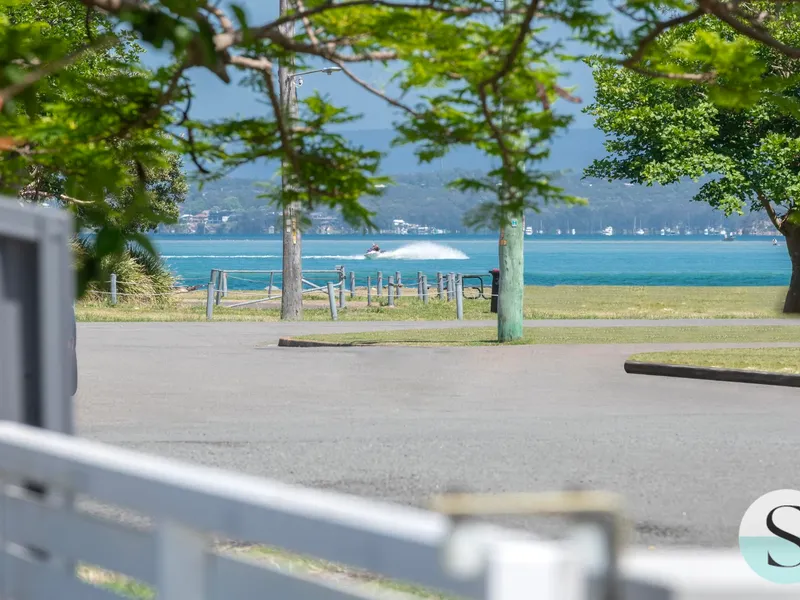 Ideally Located, Just Seconds to the Water, Extensively Renovated Single Level Living with a Holiday Lifestyle Look & Feel+Bonus Studio Accommodation!