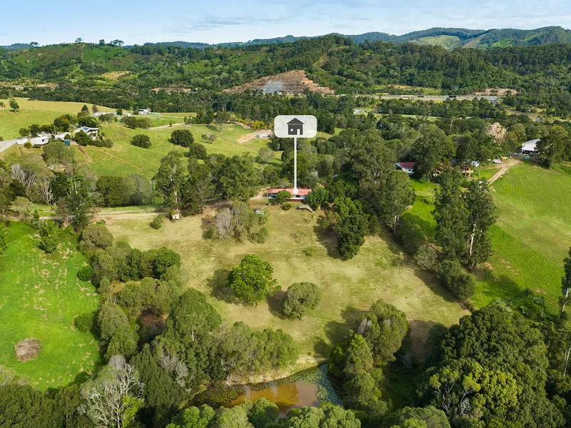 Character Cottage on 10.9 Acres of Usable Land with Huge Dam