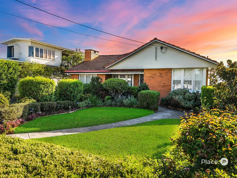 Charming four-bedroom home in prestigious Coorparoo avenue