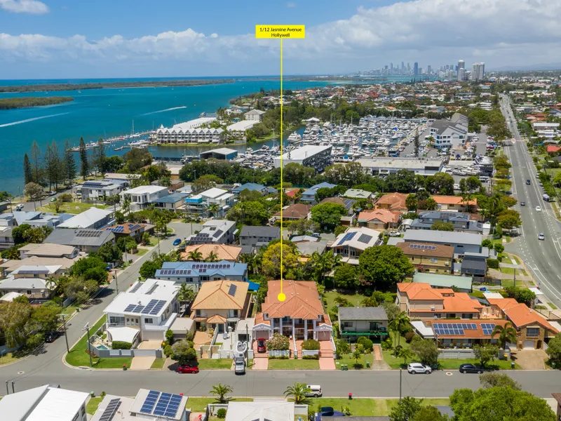 IMMACULATE MEDITERRANEAN-STYLE TOWNHOUSE CLOSE TO THE BROADWATER