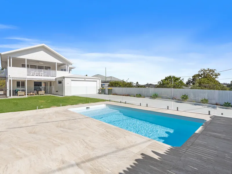 Masterfully renovated character home with city views and pool!