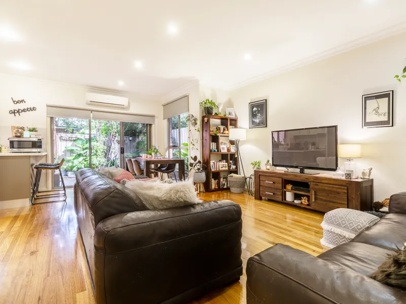 Immaculate townhouse offers easy care living with its own street frontage
