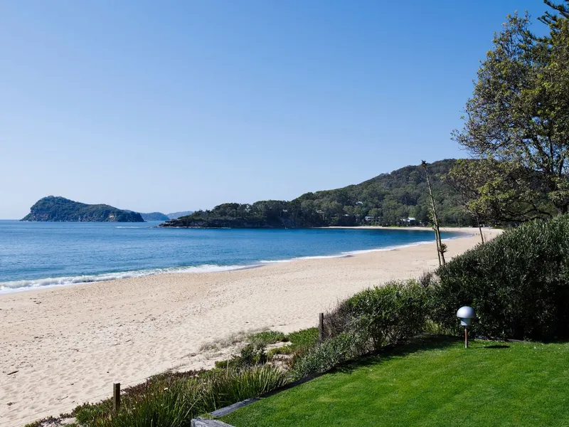 Bespoke architect designed absolute beachfront residence!