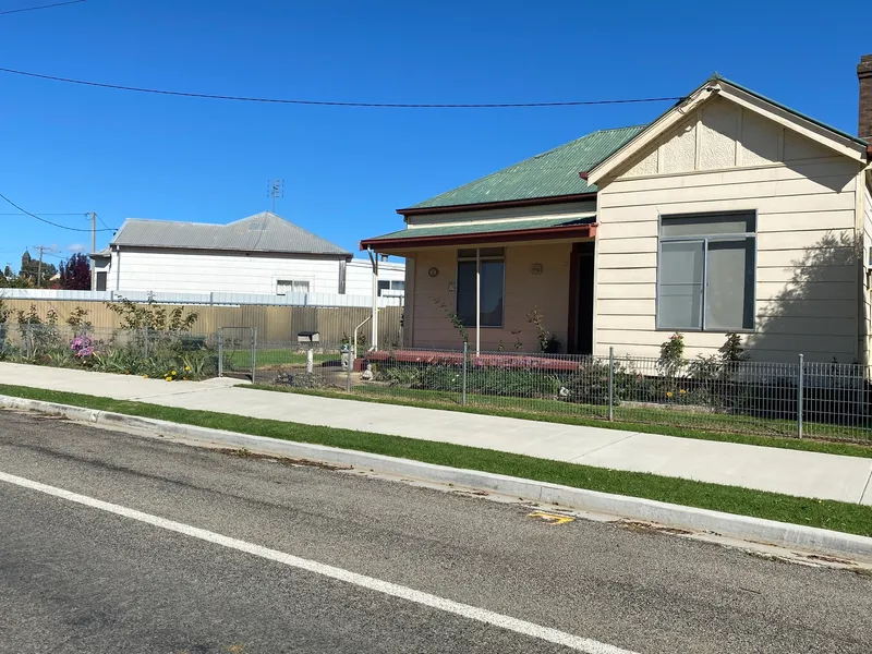 CENTRALLY LOCATED NEAT THREE BEDROOM HOUSE