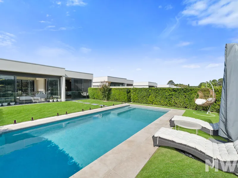 Modern, single level home overlooking the Golf Course