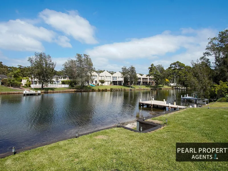 STUNNING NEW RIVERFRONT HOME