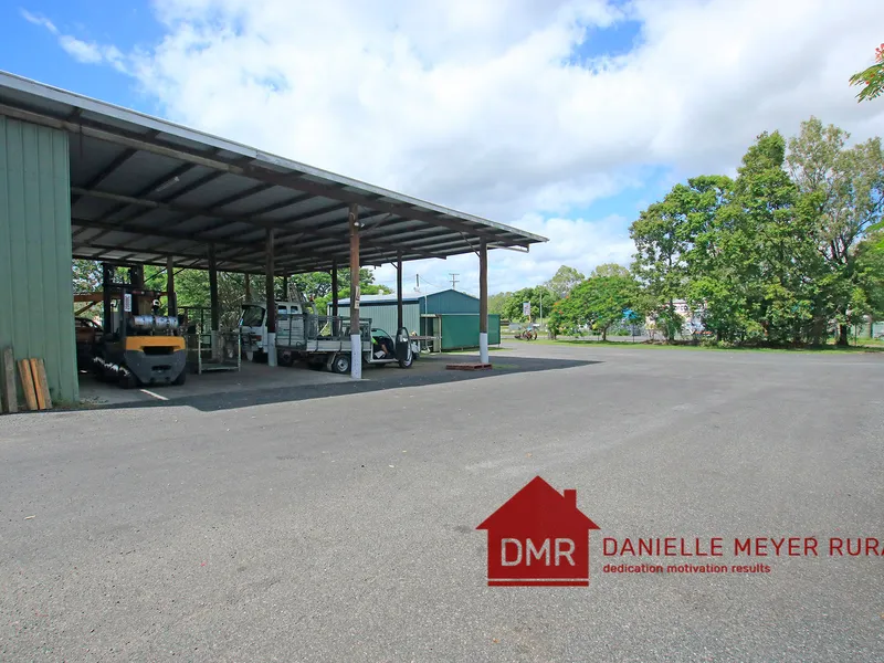 VACANT COMMERCIAL BUILDING PLUS HOUSE AND LAND