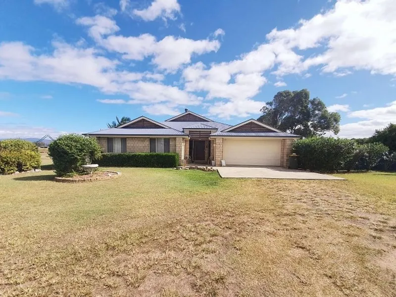 Executive style home on 10 acres set up for horses.