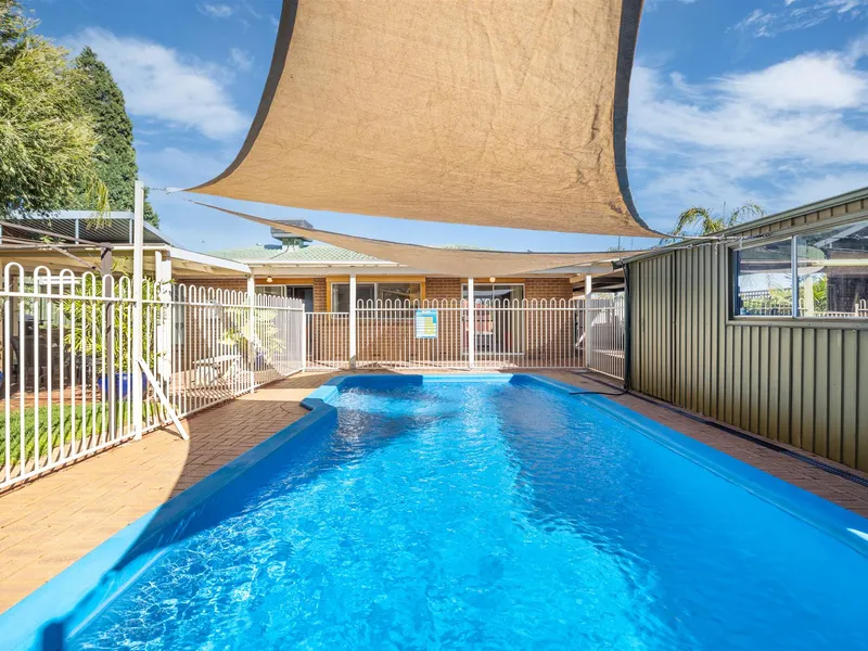 Solid Brick Ex-Display Home with In-Ground Solar Heated Pool