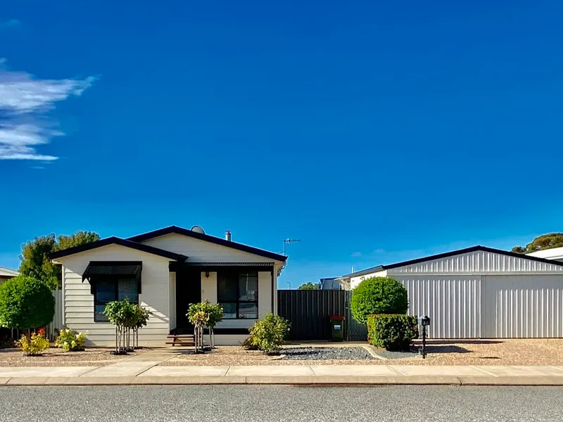 IMMACULATE 3 BEDROOM HOME WITH LARGE SHED AND BEAUTIFULLY LANDSCAPED GARDENS