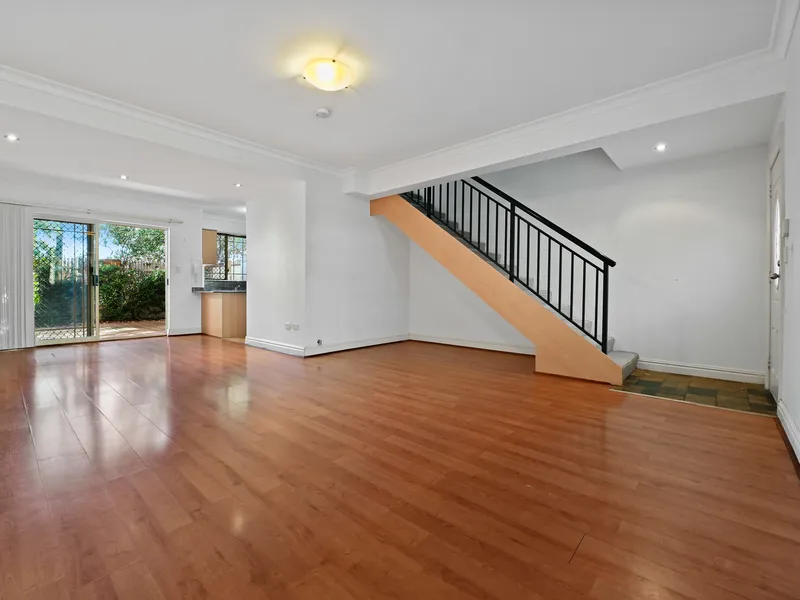 Centrally Located Townhouse with Double Garaging