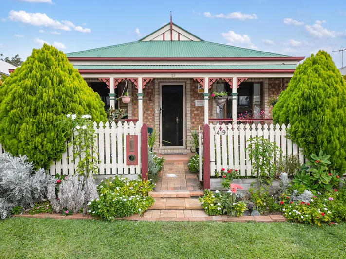 CHARMING THREE-BEDROOM COTTAGE HOME