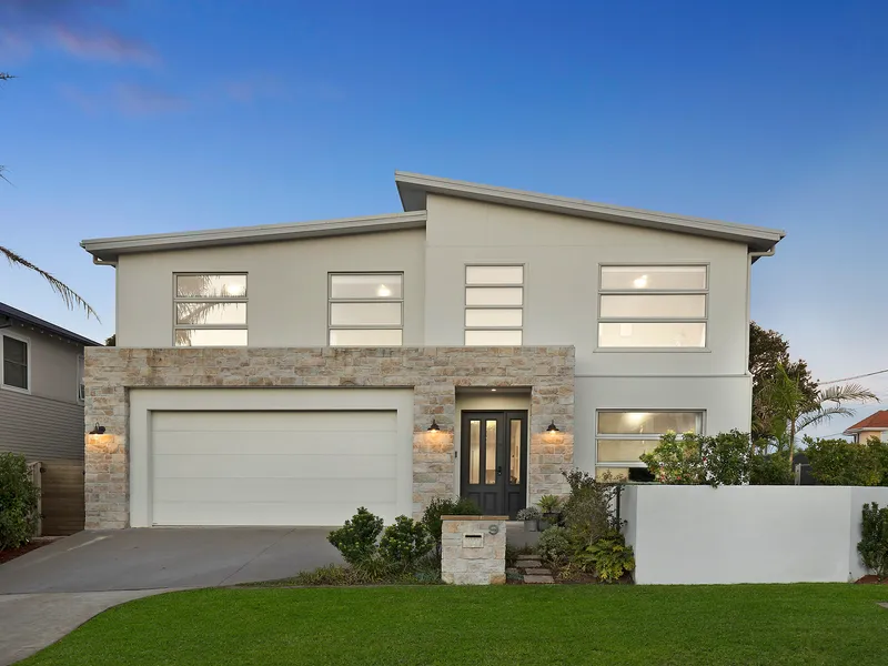 RESORT STYLE FAMILY HOME IN PRIZED COASTAL SETTING