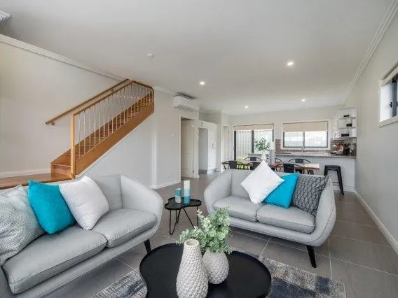 Stylish Custom Built Townhouse in Convenient Setting.