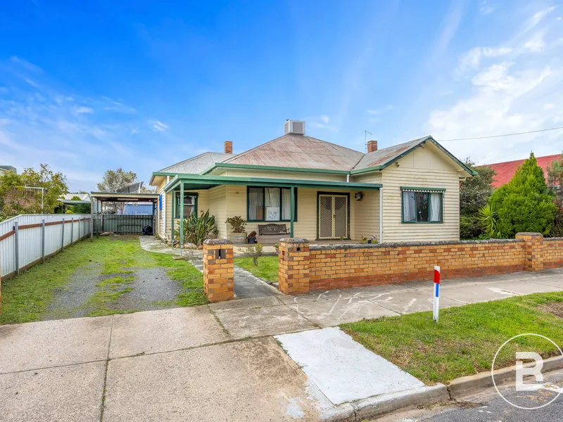 Charming Weatherboard Home with Rear Lane Access and Renovation Potential
