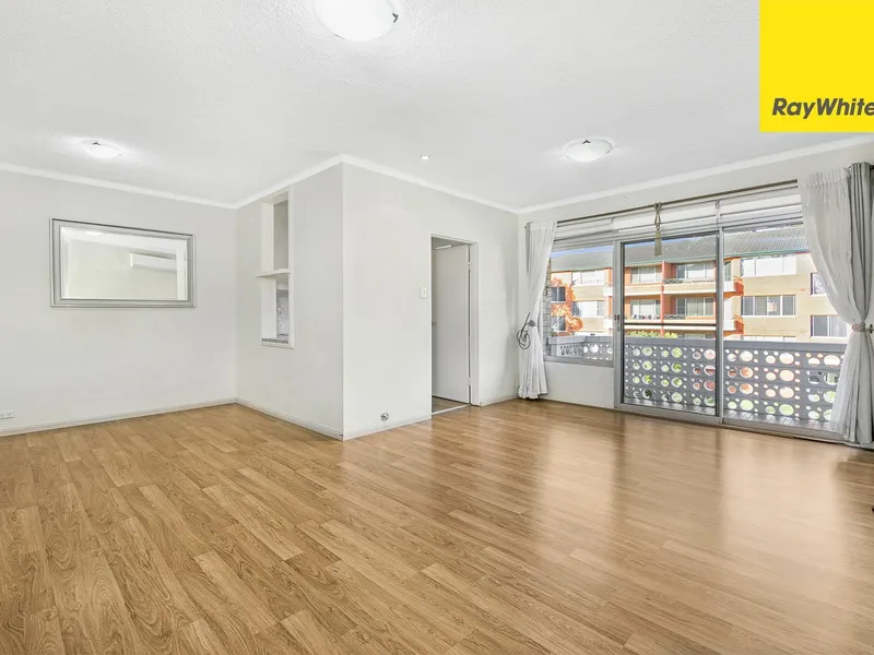 Perfectly Positioned Updated Three Bedroom Unit with Floorboards