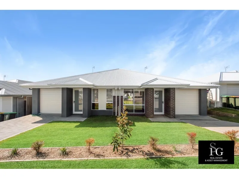 NEAR NEW DUPLEX IN GREAT LOCATION