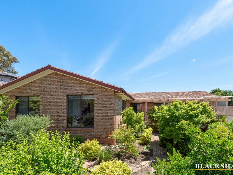 Beautiful five-bedroom family home framed in an established garden!