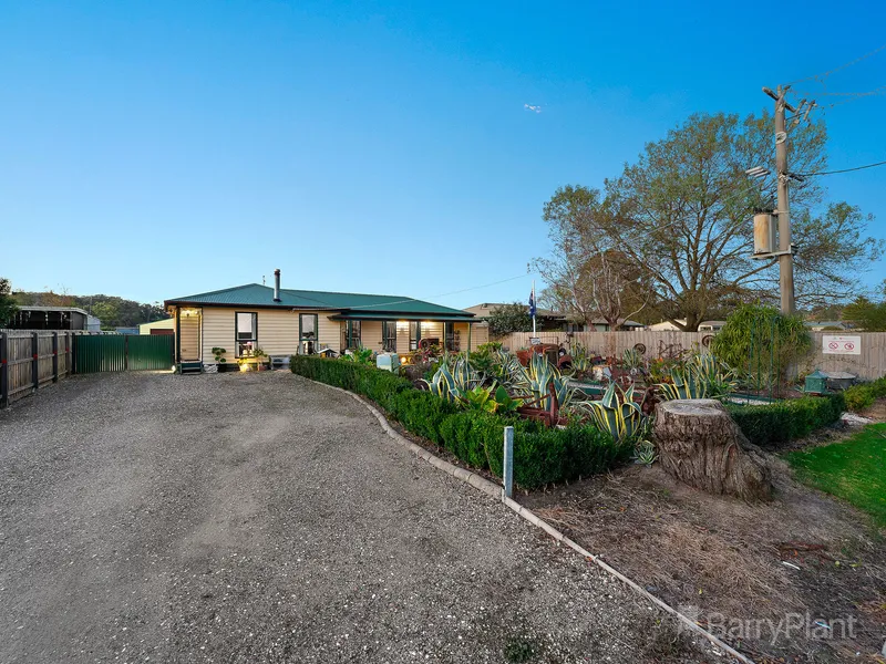 Eclectic Country Charm on almost 1/2 an acre awaits you