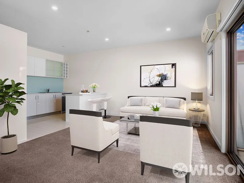 Modern, spacious sunny double storey apartment with two balconies