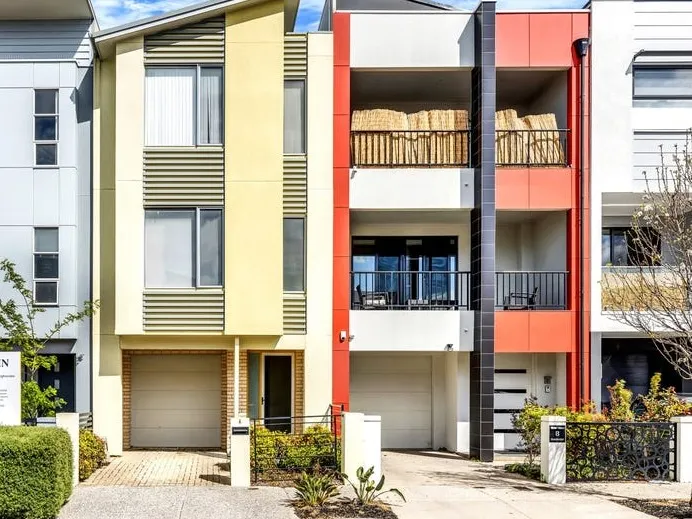 Modern Three-Storey Townhouse Near City Amenities