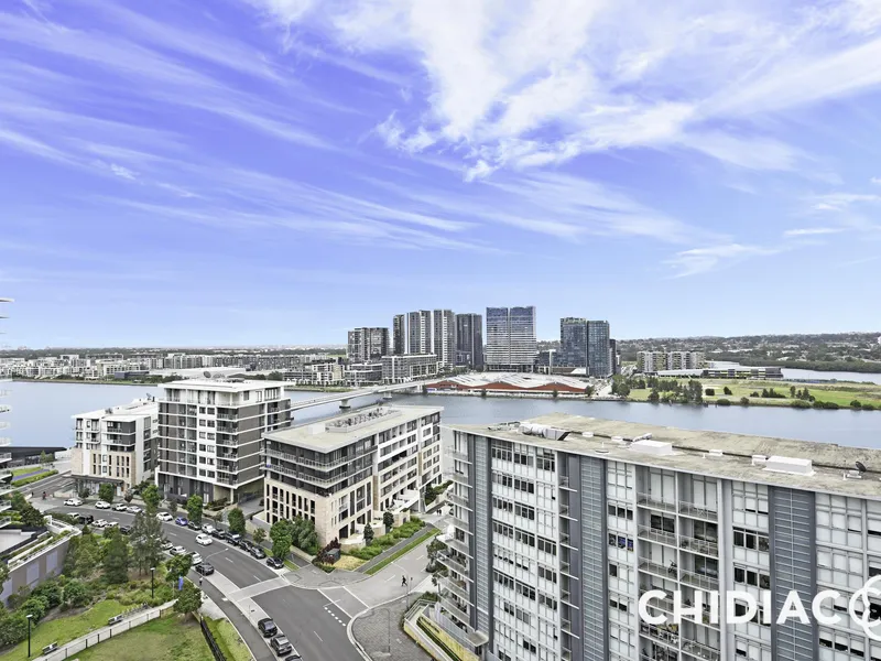 Perched high on level 10 with water views | Open balcony and winter balcony | Floorboards