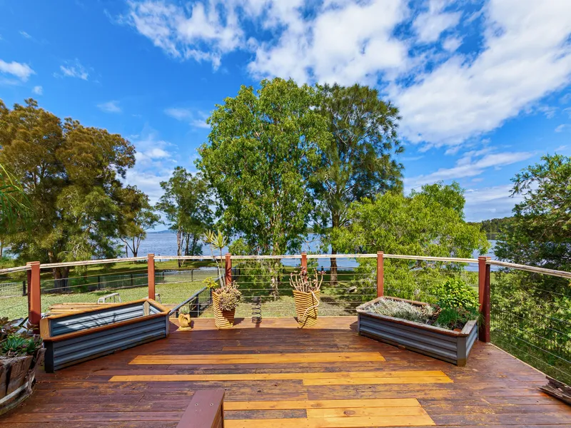 A rare lakefront opportunity with magical water views