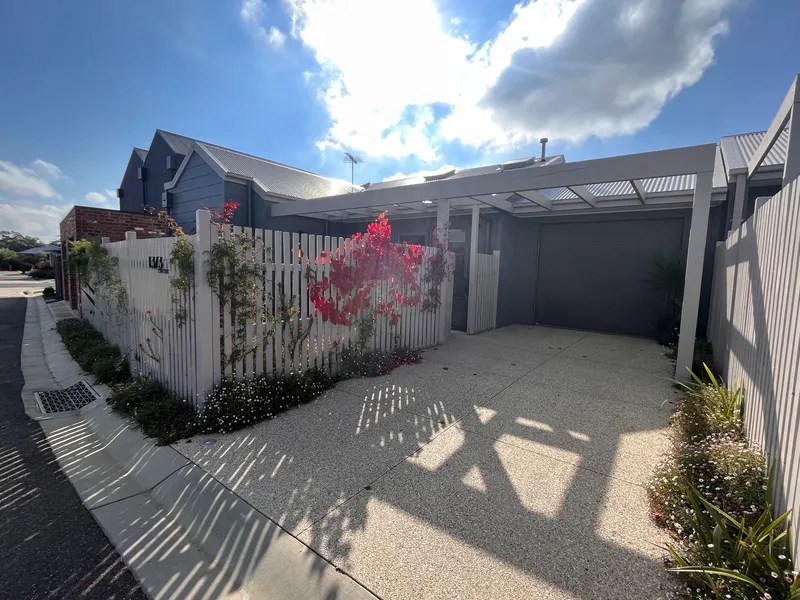 CHARMING TWO BEDROOM, TWO BATHROOM TOWNHOME