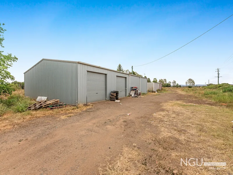 RUN A BUSINESS FROM THE HUGE SHED WITH THREE PHASE POWER OR GROW CROPS ON THE FERTILE 5.8 ACRE BLOCK!