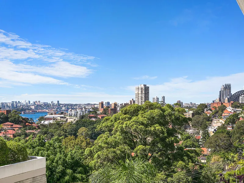 Oversized Townhouse Style Apartment (134sqm) with Two Balconies, Lock-Up Garage and Harbour Views