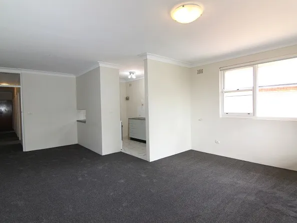 Top floor spacious 2 bedroom unit with new carpet