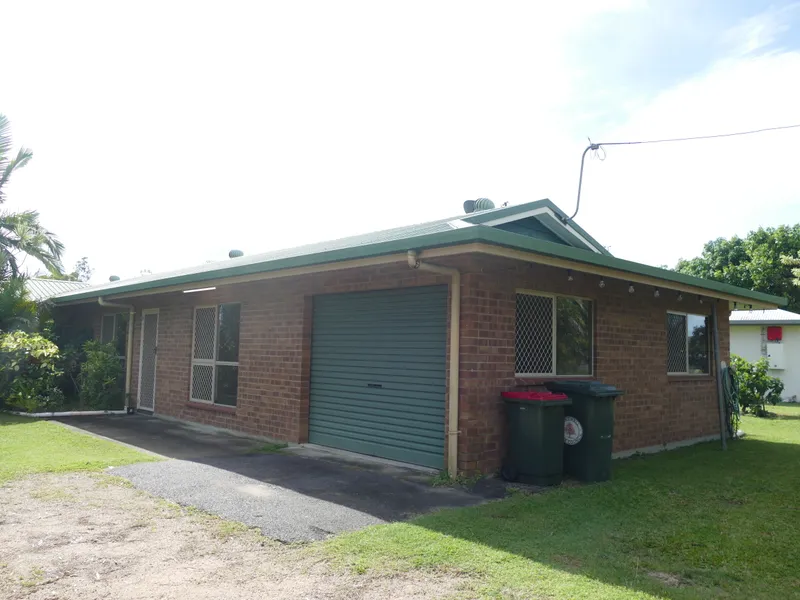 Three bedroom low set unit with air conditioning, built in wardrobes & carport!